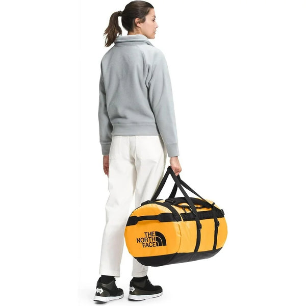 THE NORTH FACE BASE CAMP DUFFEL M GOLD BLCK